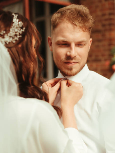 istock Bride and groom at the garden wearing wedding cloth grain effect 1390267051