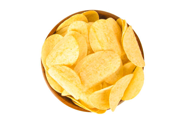 istock potato chips in brown wooden cup isolated 1390268649