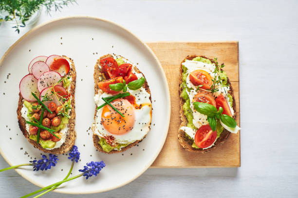 istock Vegetarian egg sandwiches on white background.. 1390271198