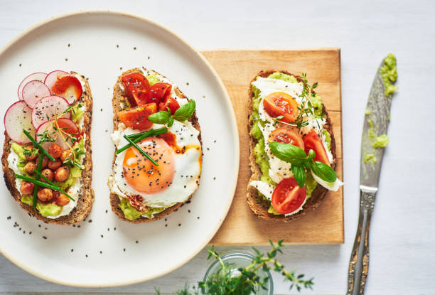 istock Vegetarian egg sandwiches on white background.. 1390271224