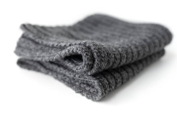 istock Dark winter scarf - isolated on white background 1390277110