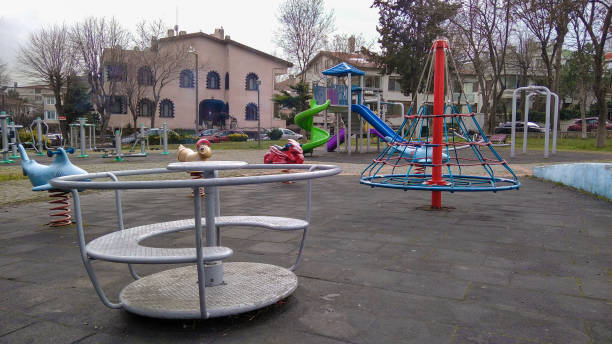 istock Empty colorful playground during the day time in autumn 1390277427