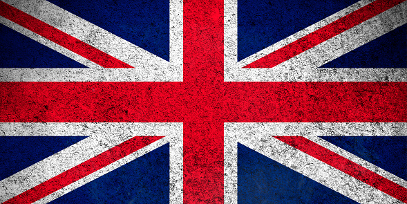 United Kingdom flag, grunge texture background photo. National country flag painted on concrete wall
