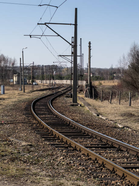istock Side, single railroad track, with electric traction. 1390279051