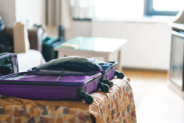 istock Packed Luggages for Travel in Hotel Room 1390283198