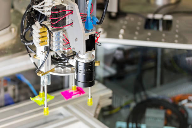 istock Close up automatic goods inspection system machine with monitoring product system and separation  by suction with vacuum method 1390285476