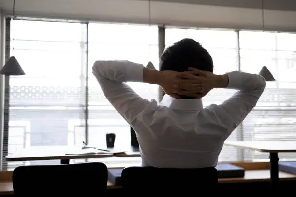 Asian businessman taking a break in a coworking space