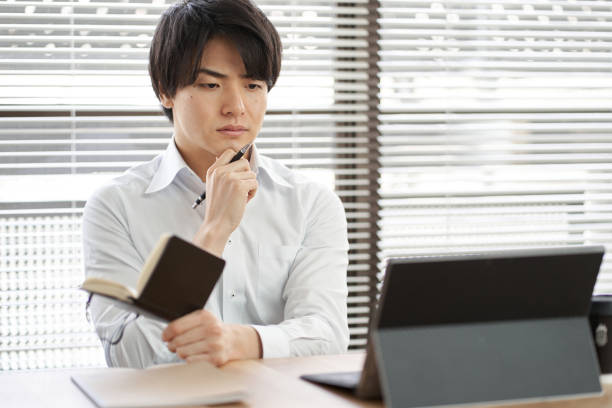 istock Asian businessman worried about schedule 1390285795