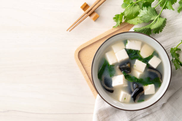 istock Delicious tofu and century egg soup with coriander. 1390288743