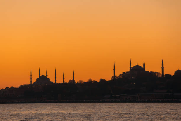 Istanbul skyline with Hagia Sophia and Blue Mosque 
at sunset stock photo
