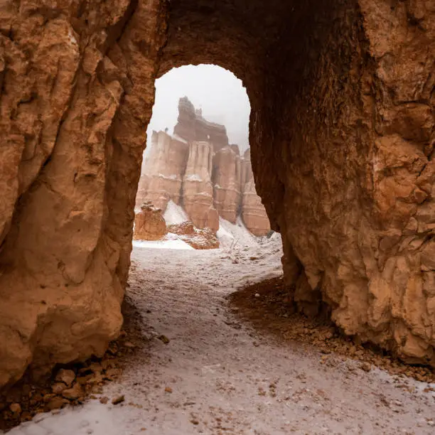 Photo of Snow Dusted Trail Through Hoodoo Tunnel