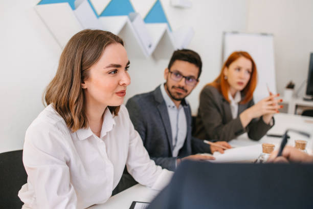 istock Young employees in a business meeting 1390291067
