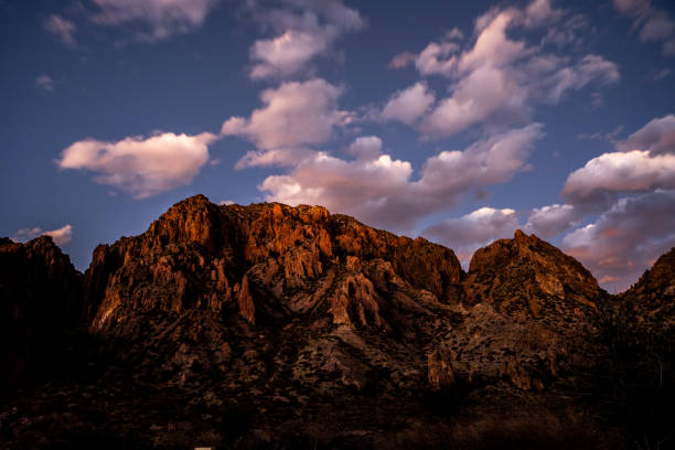 istock Western Chisos Mountains Glow Red at Sunset 1390291865