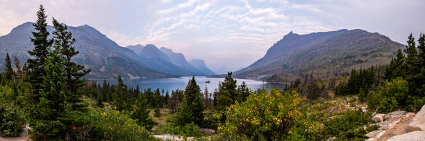 istock Wispy Clouds Hang Over Wild Goose Island Panorama 1390292105