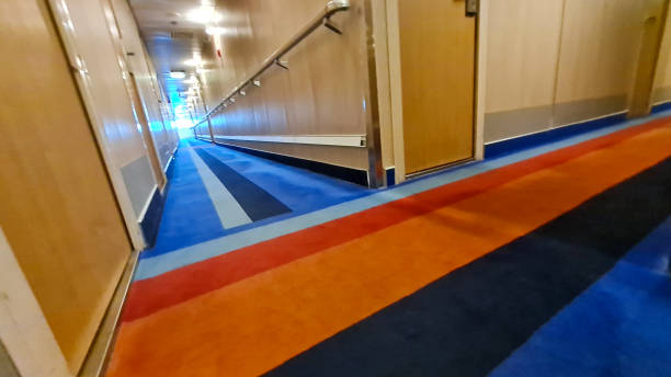 istock A long corridor in blue style with cabin doors on the deck of a modern passenger ferry 1390293122