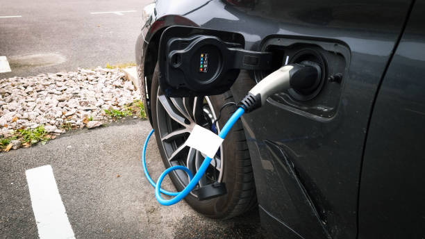istock Electric Car in Charging Station. 1390293815