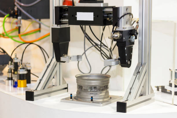 istock Close up automation grip of modeling systems checking and sorting workpiece handling and movement 1390295055