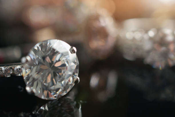 istock Beautiful diamond rings jewelry background 1390298291
