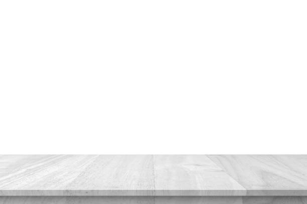 istock Empty white wooden table top isolated on white background 1390298728