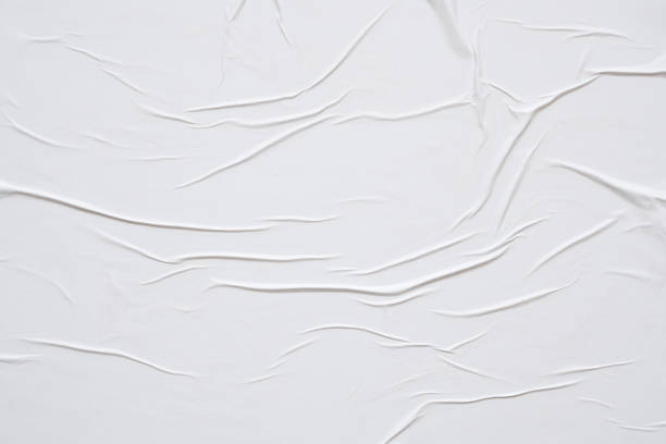 istock white crumpled and creased paper poster texture background 1390298820