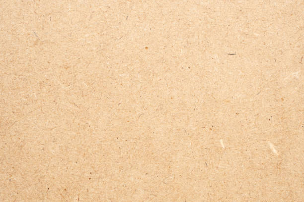 istock Old brown recycle cardboard paper texture background 1390298834