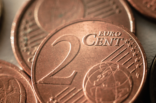Bronze coin 2 euro cents close-up, selective focus. European money.