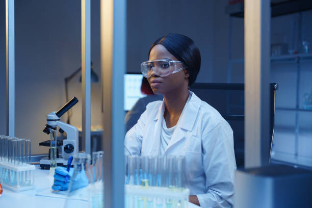istock A beautiful thoughtful  African-American scientist at work 1390303508