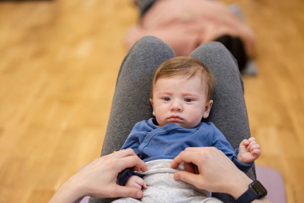 istock Baby Boy at Yoga Class 1390304801