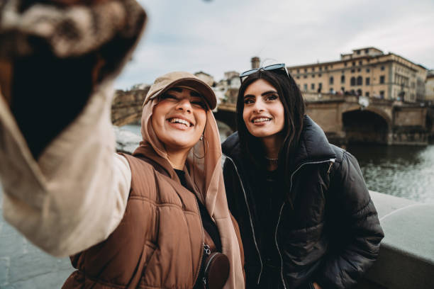 istock Two friends are taking a selfie in Florence, Italy 1390307786