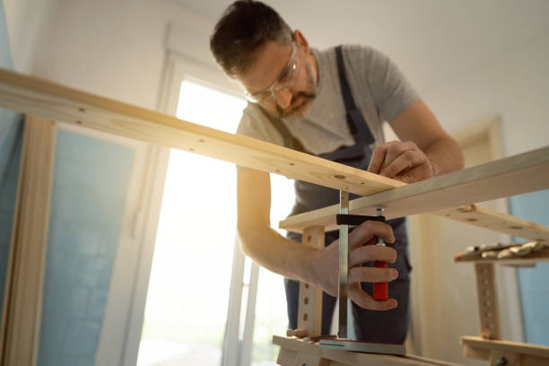 istock Carpenter making the shelf in the kitchen 1390310594