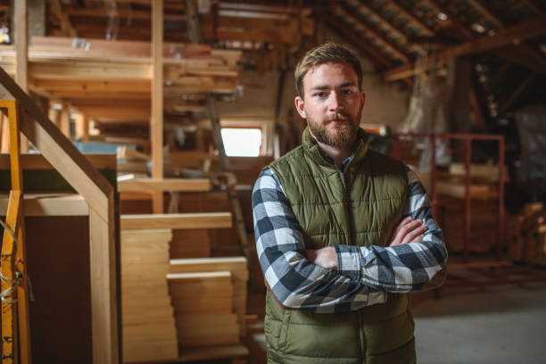 istock Caucasian Young Adult Carpenter In A Workshop 1390310617