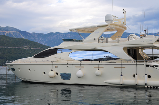 Budva, Montenegro - 13 july, 2021: Luxury yacht Azimut 85 in the Dukley Marina at summer