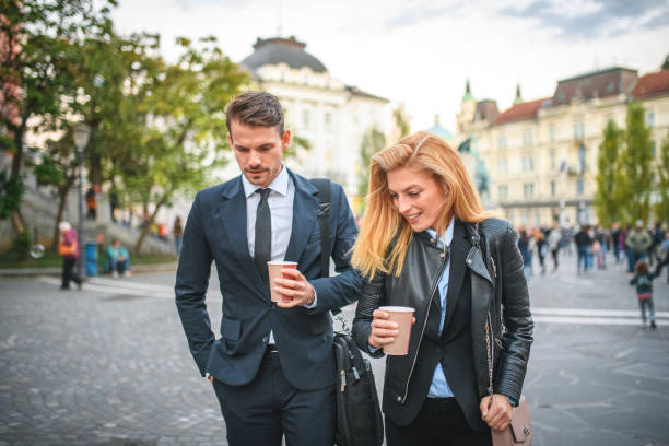 istock Young Female and Male Office Employees Returning to Work 1390313173