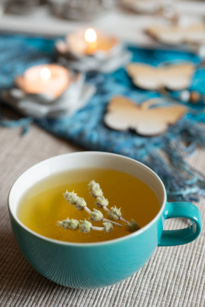 istock Tea in a turquoise cup with decoration - Greek mountain tea, herbal tea, white tea 1390317406