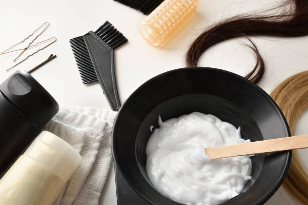 istock Hair coloring and care products on white table elevated view 1390318873