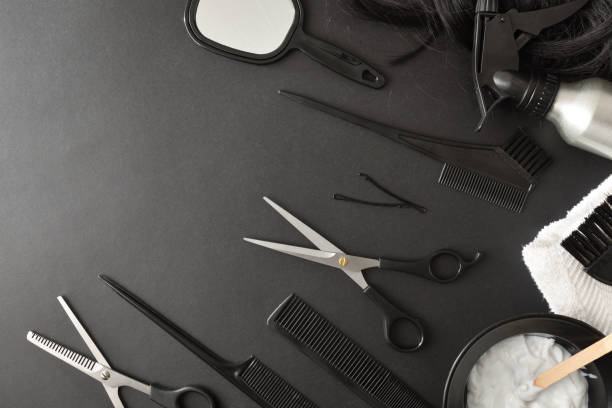 istock Set of hairdressing tools and styling on black table 1390318918