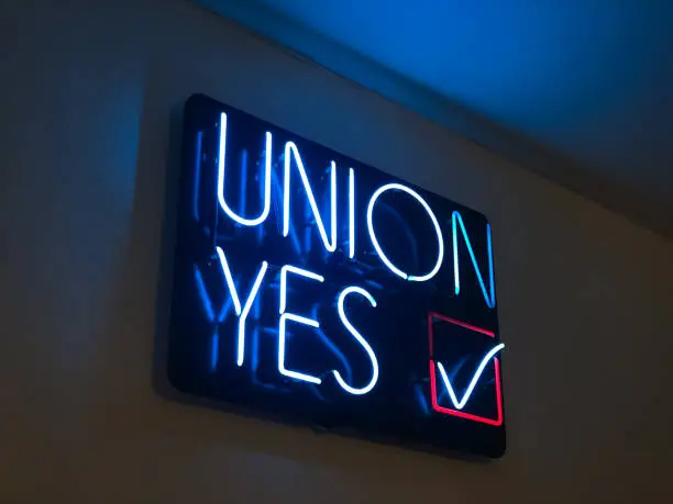 A neon Union Yes sign.