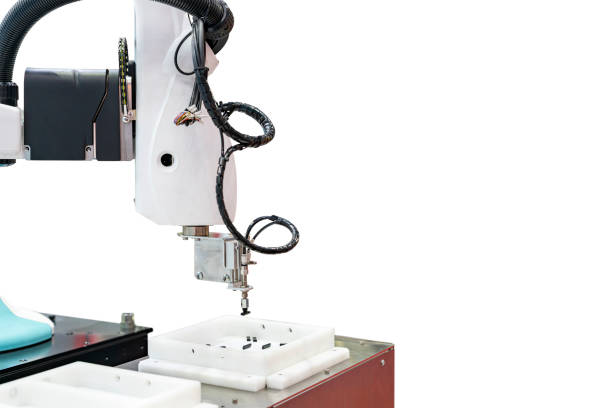 High technology automation system robot arm with vacuum sucker cup during sorting lift and place or arrange ic chip workpiece in box isolated with clipping path