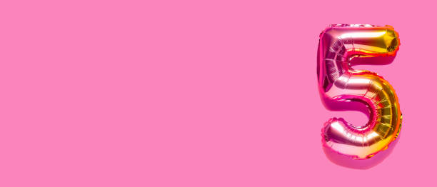 istock Rainbow foil balloon number. Top view. 1390324361