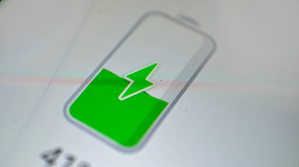 istock Low Battery Charge Cellphone Electronic Power Concept. Low Energy Smartphone Charging. Attention Mobile Phone Power Level. 1390324598