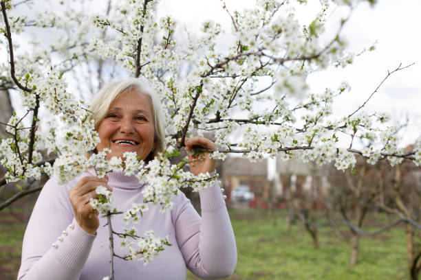 istock Senior woman enjoying in spring 1390326294