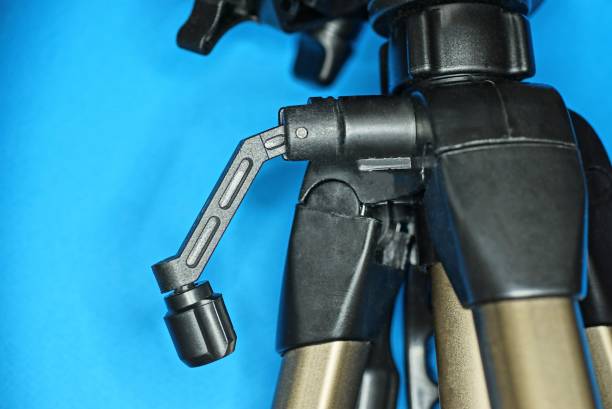 part of a gray metal tripod with a black plastic handle - large aperture imagens e fotografias de stock