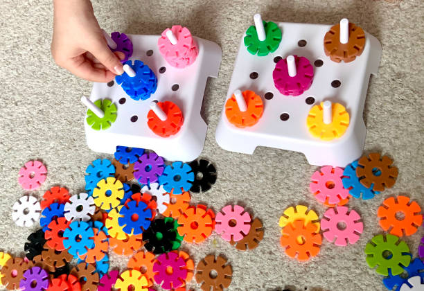 Color-coded educational toys with sticks