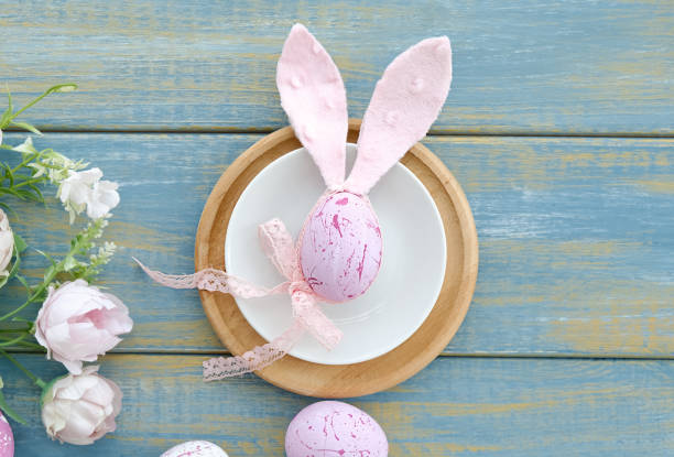 istock Easter background. Colorful spring tulips with butterflies 1390330587