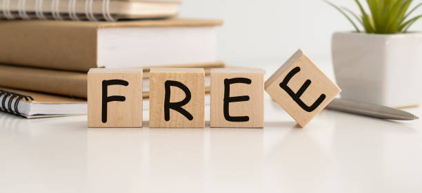 istock On wooden cubes text FREE on the white table 1390330595