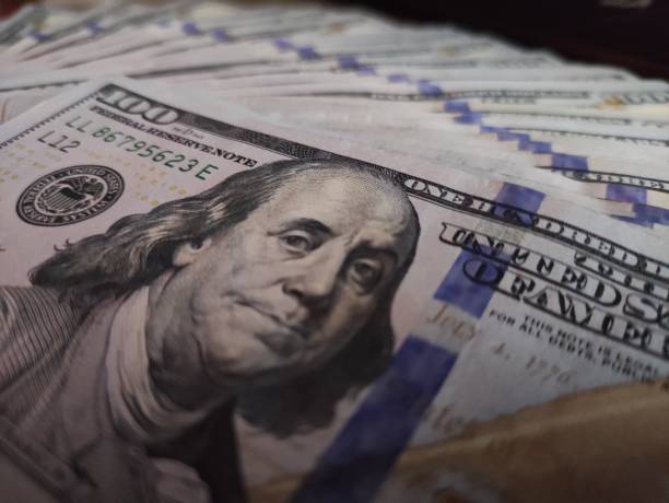 istock 100 Dollar Bills, USD 100, One Hundred American Dollar bills 1390332985