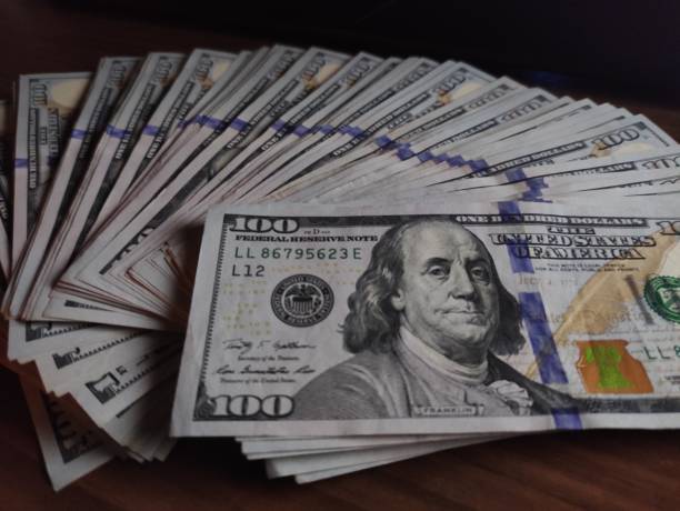 istock 100 Dollar Bills, USD 100, One Hundred American Dollar bills 1390333005