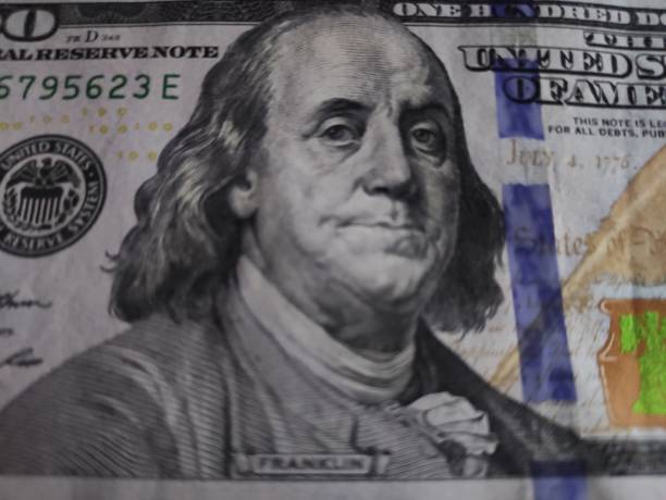 istock 100 Dollar Bills, USD 100, One Hundred American Dollar bills 1390333083