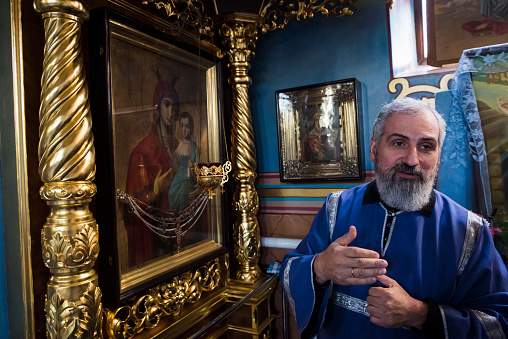 An Orthodox priest inside a church in Kramatorsk, Donetsk Oblast, Ukraine, on October 4, 2015