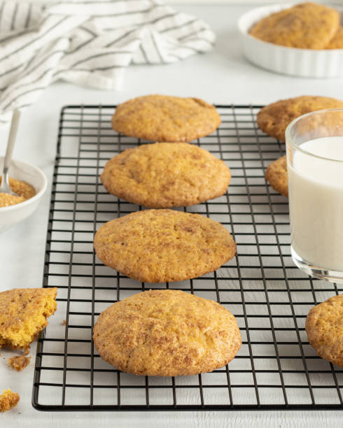 istock Pumpkin cookies with milk on the cooling rack 1390336257